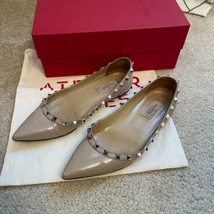 Valentino Garavani Nude patent leather rock studs flats.